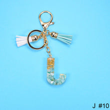 Load image into Gallery viewer, Women Fashion 26 Letters Resin Keychains Gold Foil Bag Pendant Charms Handbag Accessories Tassel Key Rings
