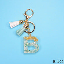 Load image into Gallery viewer, Women Fashion 26 Letters Resin Keychains Gold Foil Bag Pendant Charms Handbag Accessories Tassel Key Rings
