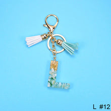 Load image into Gallery viewer, Women Fashion 26 Letters Resin Keychains Gold Foil Bag Pendant Charms Handbag Accessories Tassel Key Rings
