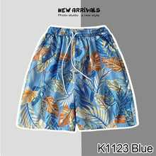 Load image into Gallery viewer, Summer Seaside Vacation Floral Shorts Men's Five-quarter Pants Casual Large Size Hawaiian Shorts Loose Beach Pants - Leaf Style
