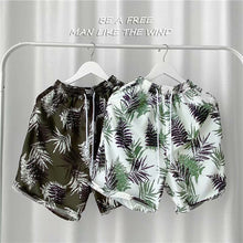 Load image into Gallery viewer, Summer Seaside Vacation Floral Shorts Men's Five-quarter Pants Casual Large Size Hawaiian Shorts Loose Beach Pants - Leaf Style
