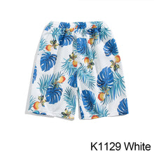 Load image into Gallery viewer, Summer Seaside Vacation Floral Shorts Men's Five-quarter Pants Casual Large Size Hawaiian Shorts Loose Beach Pants - Leaf Style
