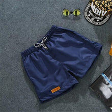 Load image into Gallery viewer, Men's Summer Beach Pants Candy Color Korean Version Slim Three-Point Pants Fashion Casual Sports Shorts
