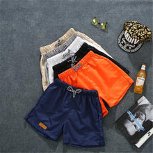 Load image into Gallery viewer, Men's Summer Beach Pants Candy Color Korean Version Slim Three-Point Pants Fashion Casual Sports Shorts
