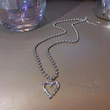Load image into Gallery viewer, Sweet Cool Hollow Heart Pendant Necklace Alloy Heart Necklace Retro Hip-hop Punk Niche Jewelry Accessories for Women
