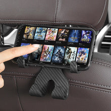 Load image into Gallery viewer, 2 in 1 Car Seat Headrest Hook and Phone Stand Headrest Hanging Holder Carbon Fibre Pattern Car Rear Seat Storage Hanger
