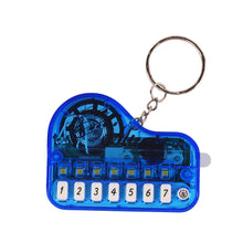 Load image into Gallery viewer, Mini Electronic Piano with Light Training Finger Piano Keychain Keyboard Piano Keyring Portable Musical Instrument Toy Key Ring
