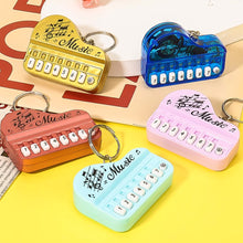 Load image into Gallery viewer, Mini Electronic Piano with Light Training Finger Piano Keychain Keyboard Piano Keyring Portable Musical Instrument Toy Key Ring
