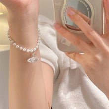 Load image into Gallery viewer, Unique Planet Pendant Pearl Bracelet Temperamental Versatile Alloy Beaded Bracelet Women Hand Jewelry
