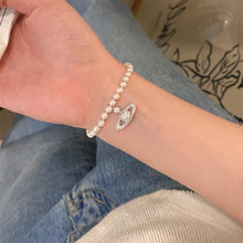 Load image into Gallery viewer, Unique Planet Pendant Pearl Bracelet Temperamental Versatile Alloy Beaded Bracelet Women Hand Jewelry
