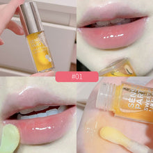 Load image into Gallery viewer, Moisturizing Lip Balm Lip Oil Transparent Lip Gloss Primer Colorless Lip Gloss Lipstick Base Fragrance Non-sticky Moisturizes Lip Gloss
