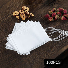 Load image into Gallery viewer, 100pcs Disposable Tea Bags with String Heal Seal Non-woven Fabric Tea Filter Bag for Herb Loose Tea Teaware Spice Filter Bag
