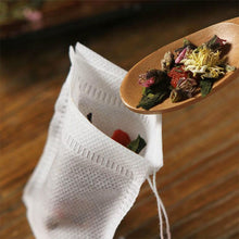 Load image into Gallery viewer, 100pcs Disposable Tea Bags with String Heal Seal Non-woven Fabric Tea Filter Bag for Herb Loose Tea Teaware Spice Filter Bag
