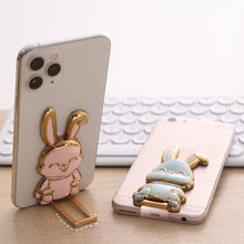 Load image into Gallery viewer, 1PC Portable Electroplated Smile Rabbit Pasteable Mobile Phone Stand Hardware Push Rod Foldable Desktop Lazy Stand
