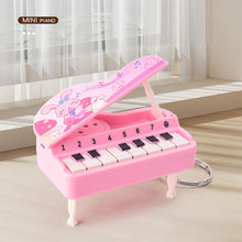 Load image into Gallery viewer, Mini Electronic Piano with Light Training Finger Piano Keychain Keyboard Piano Portable Musical Instrument Toy Key Ring

