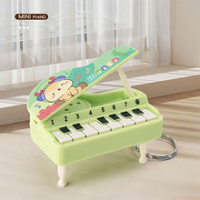 Load image into Gallery viewer, Mini Electronic Piano with Light Training Finger Piano Keychain Keyboard Piano Portable Musical Instrument Toy Key Ring
