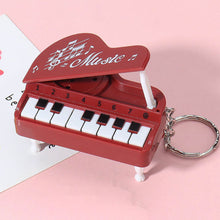 Load image into Gallery viewer, Mini Electronic Piano with Light Training Finger Piano Keychain Keyboard Piano Portable Musical Instrument Toy Key Ring
