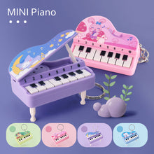 Load image into Gallery viewer, Mini Electronic Piano with Light Training Finger Piano Keychain Keyboard Piano Portable Musical Instrument Toy Key Ring

