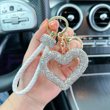 Load image into Gallery viewer, Car Hollow Love Out Ceramic Clay Full Diamond Key Chain Leather Rope Sticking Water Diamond Key Pendant Simple
