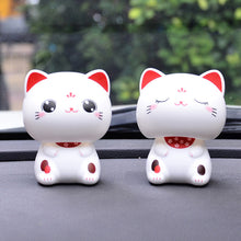 Load image into Gallery viewer, Cute Nod Head Solar Powered Lucky Fortune Cat Wealth Waving Figurines for Home Decorations for Car Decorations and for Gift

