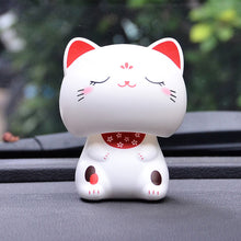 Load image into Gallery viewer, Cute Nod Head Solar Powered Lucky Fortune Cat Wealth Waving Figurines for Home Decorations for Car Decorations and for Gift
