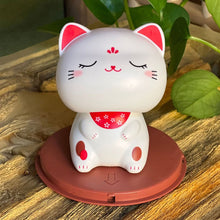 Load image into Gallery viewer, Cute Nod Head Solar Powered Lucky Fortune Cat Wealth Waving Figurines for Home Decorations for Car Decorations and for Gift
