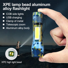Load image into Gallery viewer, Outdoor Camo XPE Lamp Bead Zoom Long Range Flashlight Side Light COB Aluminum Alloy Flashlight USB Charging
