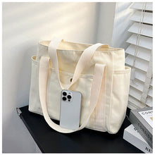 Load image into Gallery viewer, Large Capacity Canvas Tote Bags for Work Commuting Carrying Bag College Style Student Outfit Book Shoulder Bag
