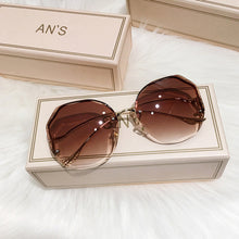 Load image into Gallery viewer, Rimless Cut Edge Sunglasses Irregular Circle Fashion Popular Women Men Shades Small Square Sun Glasses For Female Male
