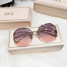 Load image into Gallery viewer, Rimless Cut Edge Sunglasses Irregular Circle Fashion Popular Women Men Shades Small Square Sun Glasses For Female Male
