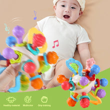 Load image into Gallery viewer, 1Pc Baby Rattle Toy Soft Sensory Training Silicone Activity Ball 0 12 Months Development Hand Bell Early Educational Toys For Infant
