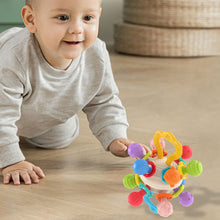 Load image into Gallery viewer, 1Pc Baby Rattle Toy Soft Sensory Training Silicone Activity Ball 0 12 Months Development Hand Bell Early Educational Toys For Infant
