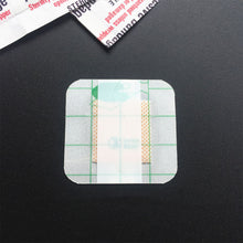 Load image into Gallery viewer, 50/100PCS 38*38mm Transparent PU Waterproof Wound Plaster Band Aid Adhesive Bandage Protective Sticker for Outdoor Home First Aid
