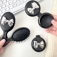 Load image into Gallery viewer, Cute Bowknot Airbag Comb Cartoon Mini Folding Portable Air Cushion Comb Massage Scalp Hairdressing Hair Comb Hair Styling Tool
