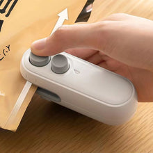 Load image into Gallery viewer, Mini Sealing Machine Magnetic Suction Rechargeable Household Snack Preservation Sealing Tool Multifunctional Kitchen Appliance
