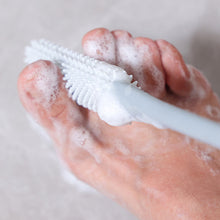 Load image into Gallery viewer, Toe Seam Cleaning Brush Relieve Itching Exfoliate Extended Handle Soft Rubber Brush Head Convenient Storable Foot Cleaning Tool

