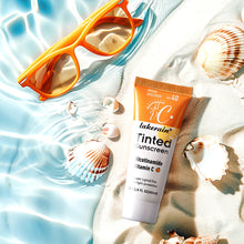 Load image into Gallery viewer, 40ml SPF40 Vitamin C Sunscreen Foundation Vitamin E Moisturizing Whitening Even Skin Tone Delays Aging and Reduces Skin Fine Lines
