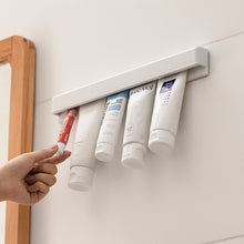 Load image into Gallery viewer, Self-adhesive Wall Mount Toothpaste Holder Multifunctional Space-Saving Storage Squeezer Holder Bathroom Shelves
