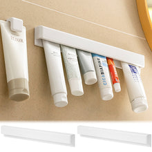 Load image into Gallery viewer, Self-adhesive Wall Mount Toothpaste Holder Multifunctional Space-Saving Storage Squeezer Holder Bathroom Shelves
