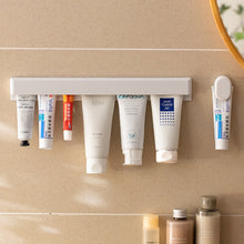 Load image into Gallery viewer, Self-adhesive Wall Mount Toothpaste Holder Multifunctional Space-Saving Storage Squeezer Holder Bathroom Shelves
