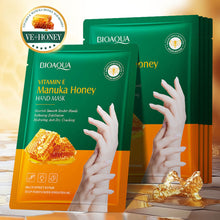 Load image into Gallery viewer, 1/5pcs Vitamin E Hand Mask Honey Nourishing Intense Moisturizing Cracked Skin Repair Silky Smooth Hands Glove Mask Anti-Aging Overnight Hand Treatment
