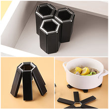Load image into Gallery viewer, Foldable Insulation Pad Pot Mat Dish Placemat Coaster Folding Heat Insulation High Temperature Pots and Pans Kitchen Gadgets
