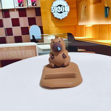 Load image into Gallery viewer, Capybara Phone Holder PVC Doll Support Capybara Mobile Phone Stand Cartoon Animal Capybara Cell Phone Bracket
