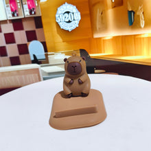 Load image into Gallery viewer, Capybara Phone Holder PVC Doll Support Capybara Mobile Phone Stand Cartoon Animal Capybara Cell Phone Bracket
