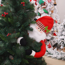 Load image into Gallery viewer, Christmas Tree Topper Santa Snowman Ornament Holding Hugging Tree Crown Christmas Gift Idea Funny Scene Setter Decor

