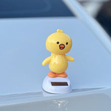 Load image into Gallery viewer, Solar Powered Duck Car Ornament Shaking Head Toy Car Dashboard Ornament Auto Home Decoration Solar Swing for Kids Gifts
