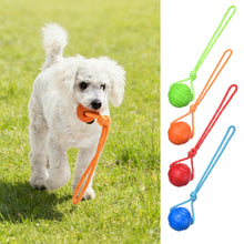 Load image into Gallery viewer, Solid Rubber Rope Ball Dog Toy Bite Resistant Chew Ball with Rope Handle for Interactive Tug of War &amp; Outdoor Fetch Training Toy for Medium Large Dogs
