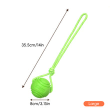 Load image into Gallery viewer, Solid Rubber Rope Ball Dog Toy Bite Resistant Chew Ball with Rope Handle for Interactive Tug of War &amp; Outdoor Fetch Training Toy for Medium Large Dogs
