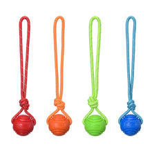 Load image into Gallery viewer, Solid Rubber Rope Ball Dog Toy Bite Resistant Chew Ball with Rope Handle for Interactive Tug of War &amp; Outdoor Fetch Training Toy for Medium Large Dogs
