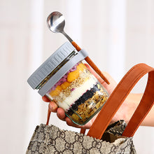 Load image into Gallery viewer, Portable Breakfast Jar with Lid and Spoon Food Storage Glass Jar With Scale for Overnight Oats Leak Proof Cup for Cereal Yogurt Salad Meal Prep On the Go
